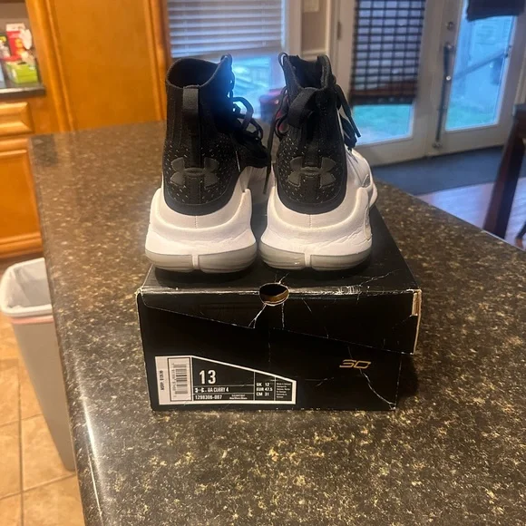 Men's White and Black UA Curry 4 Basketball - Picture 3 of 5